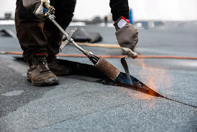 dakspecialist bitumen repareren schoorsteen spoedreparartie doetinchem